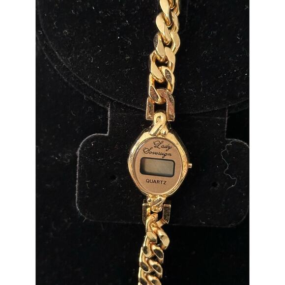Lady Sovereign Gold Tone Band Oval Shaped Face Digital Wristwatch